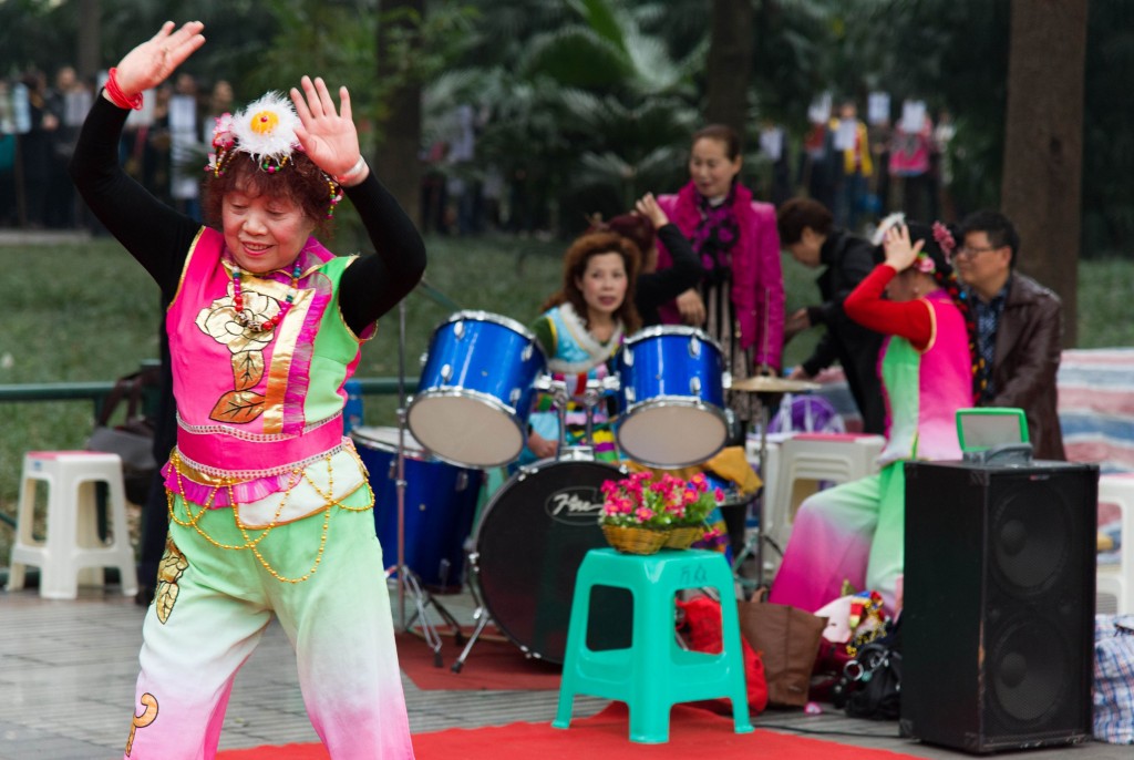 retired women providing entertainment by performing in Chengdu's People's Park,